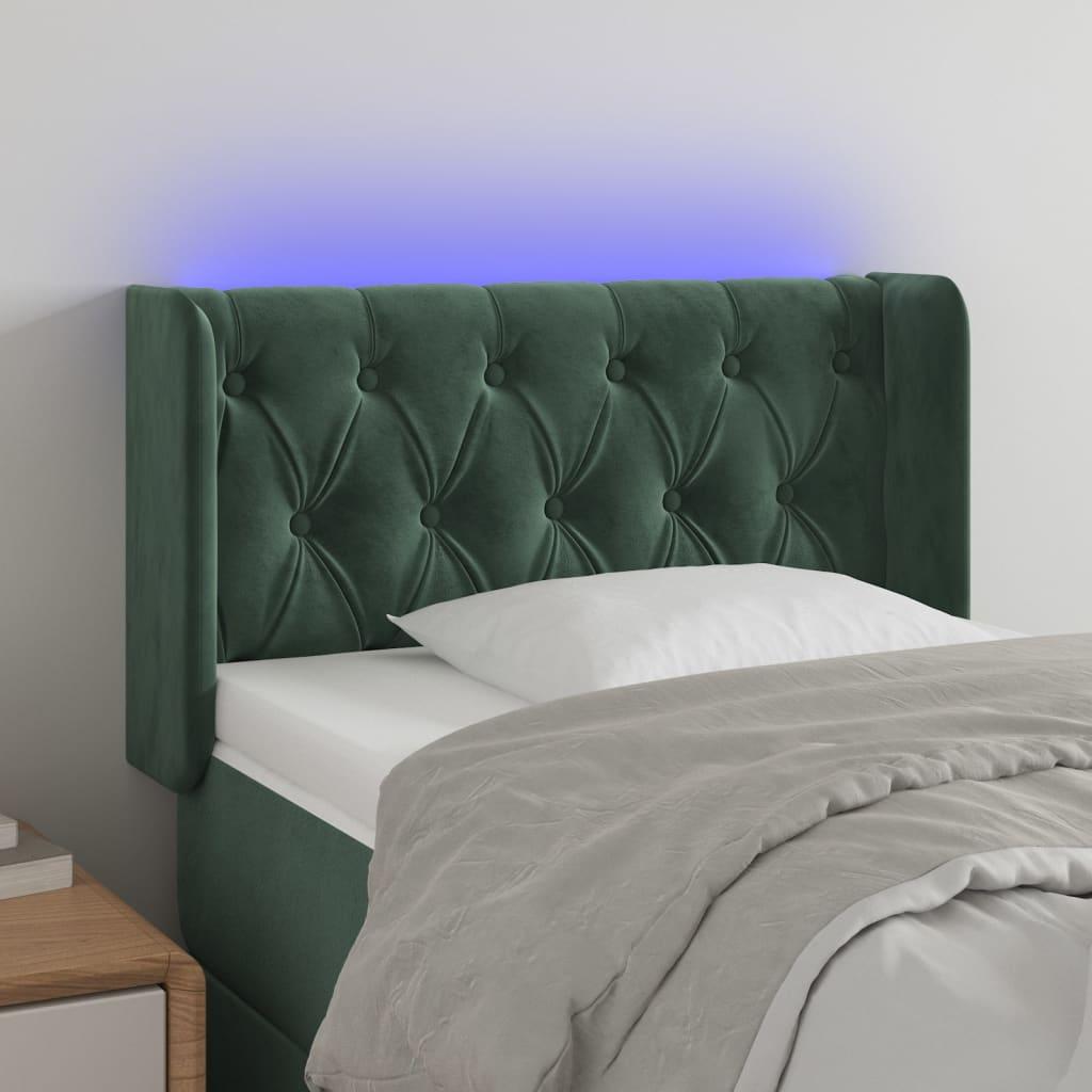 Sengegavl med LED-lys 83x16x78/88 cm fløjl Mørkegrøn billede