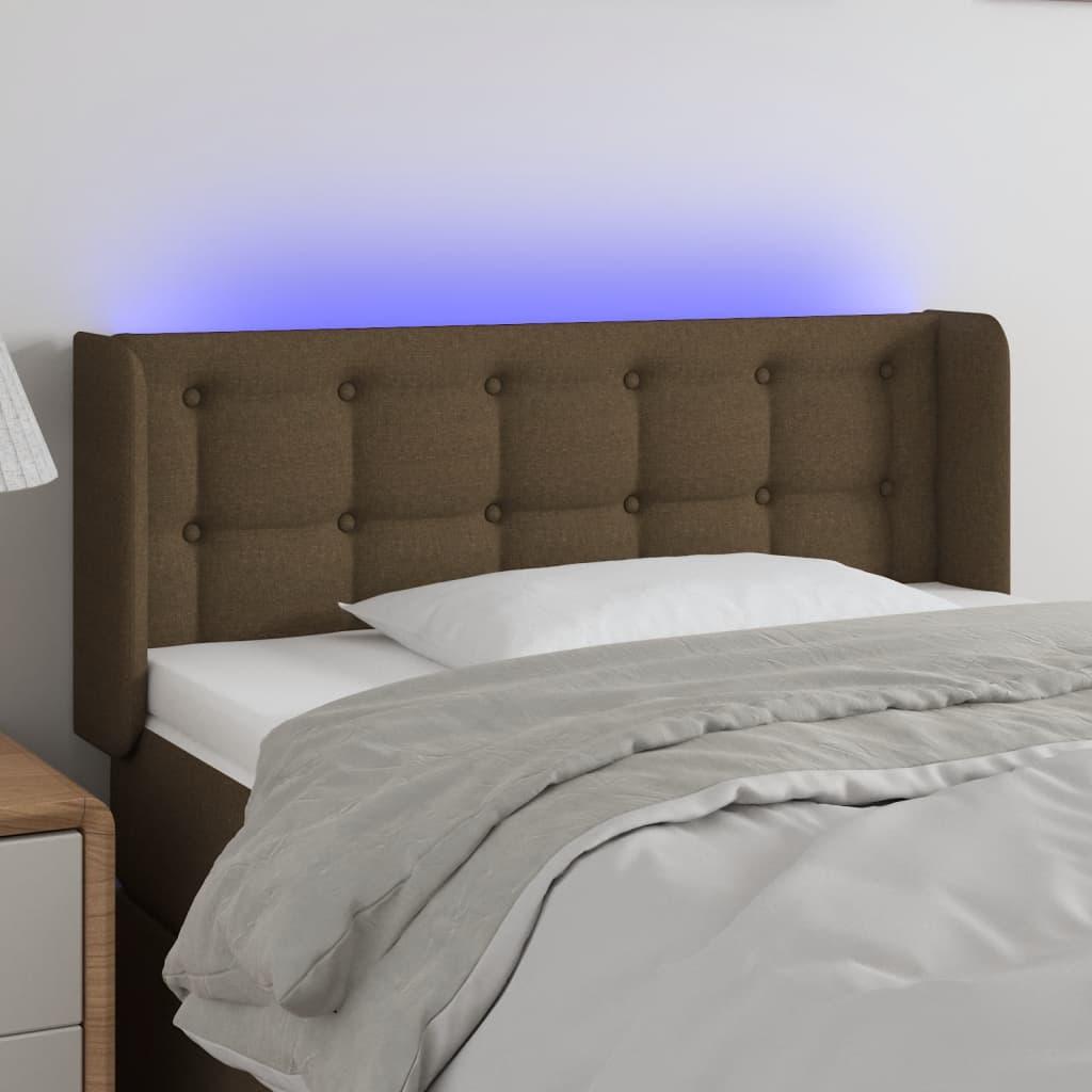 Sengegavl med LED-lys 103x16x78/88 cm stof mørkebrun billede