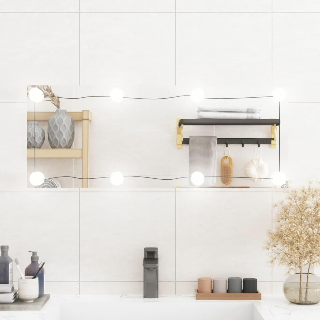 Vægspejl med LED-lys 30x80 cm rektangel glas billede