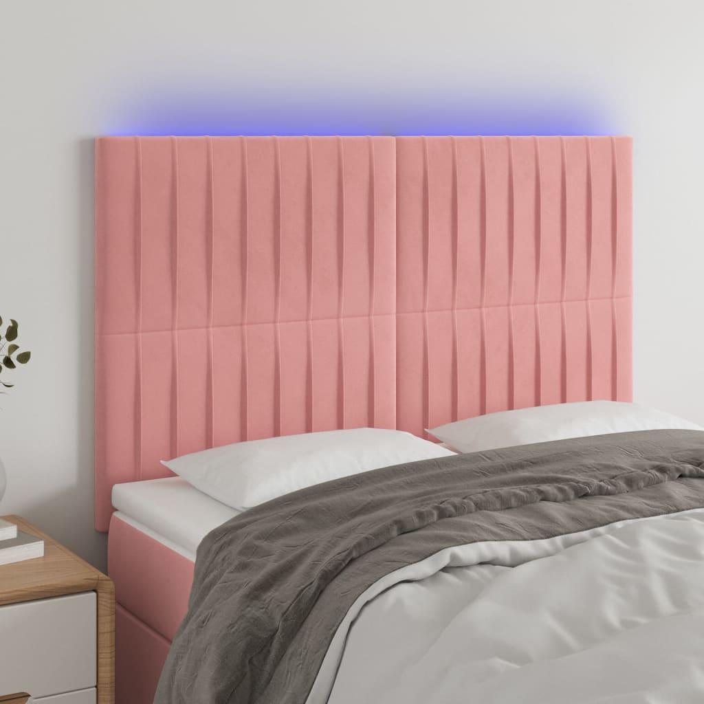 Sengegavl med LED-lys 144x5x118/128 cm fløjl lyserød billede