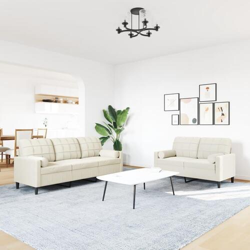 2 personers sofa med hynder og bolsterpuder velour cremefarvet