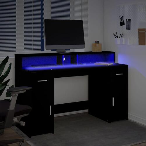 Skrivebord med LED-lys 140x55x91 cm konstrueret træ sort