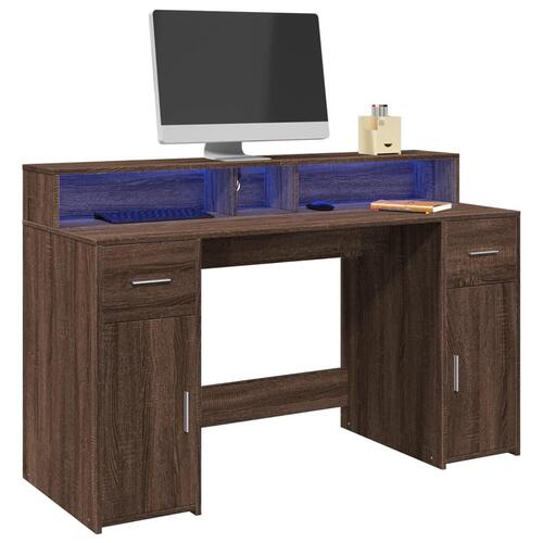 Skrivebord med LED-lys 140x55x91 cm konstrueret træ brunt eg