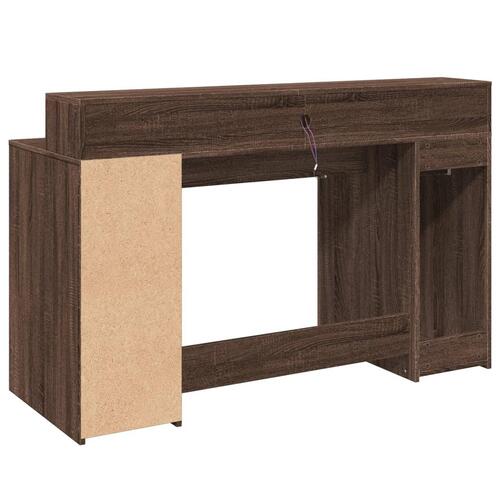 Skrivebord med LED-lys 140x55x91 cm konstrueret træ brunt eg