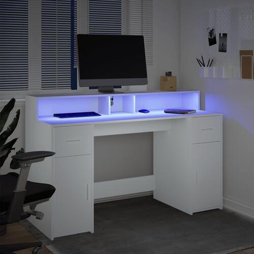 Skrivebord med LED-lys 140x55x91 cm konstrueret træ hvid