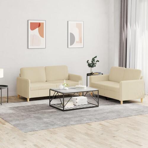 2 personers sofa med hynder stof cremefarvet