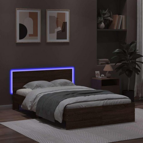 Sengeramme med sengegavl og LED-lys 120x190 cm brunt egetræ