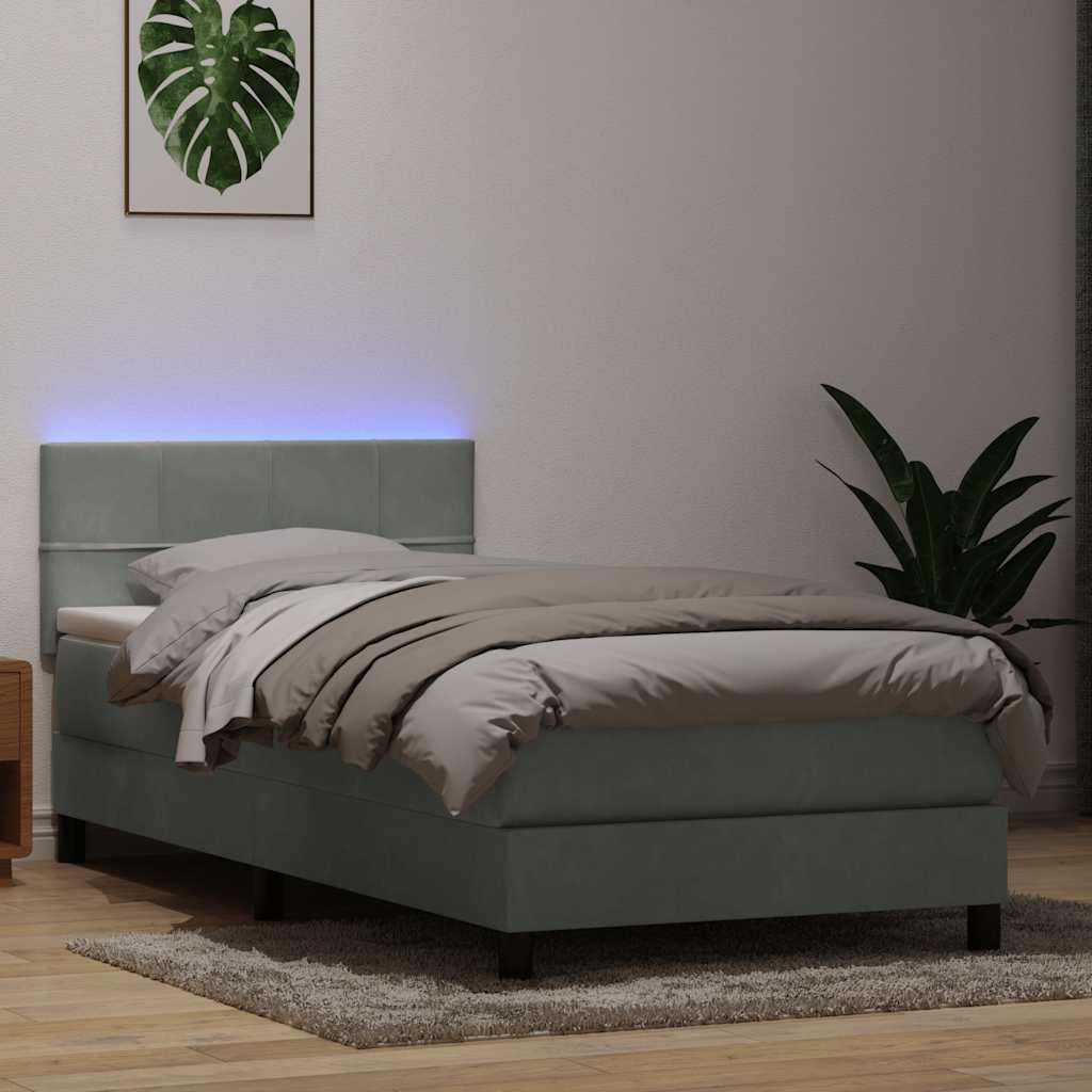 Kontinentalseng med madras og LED-lys lysegrå 90x210 cm fløjl