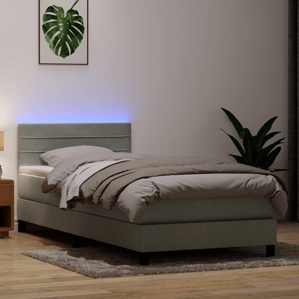Kontinentalseng med madras og LED-lys lysegrå 90x210 cm fløjl
