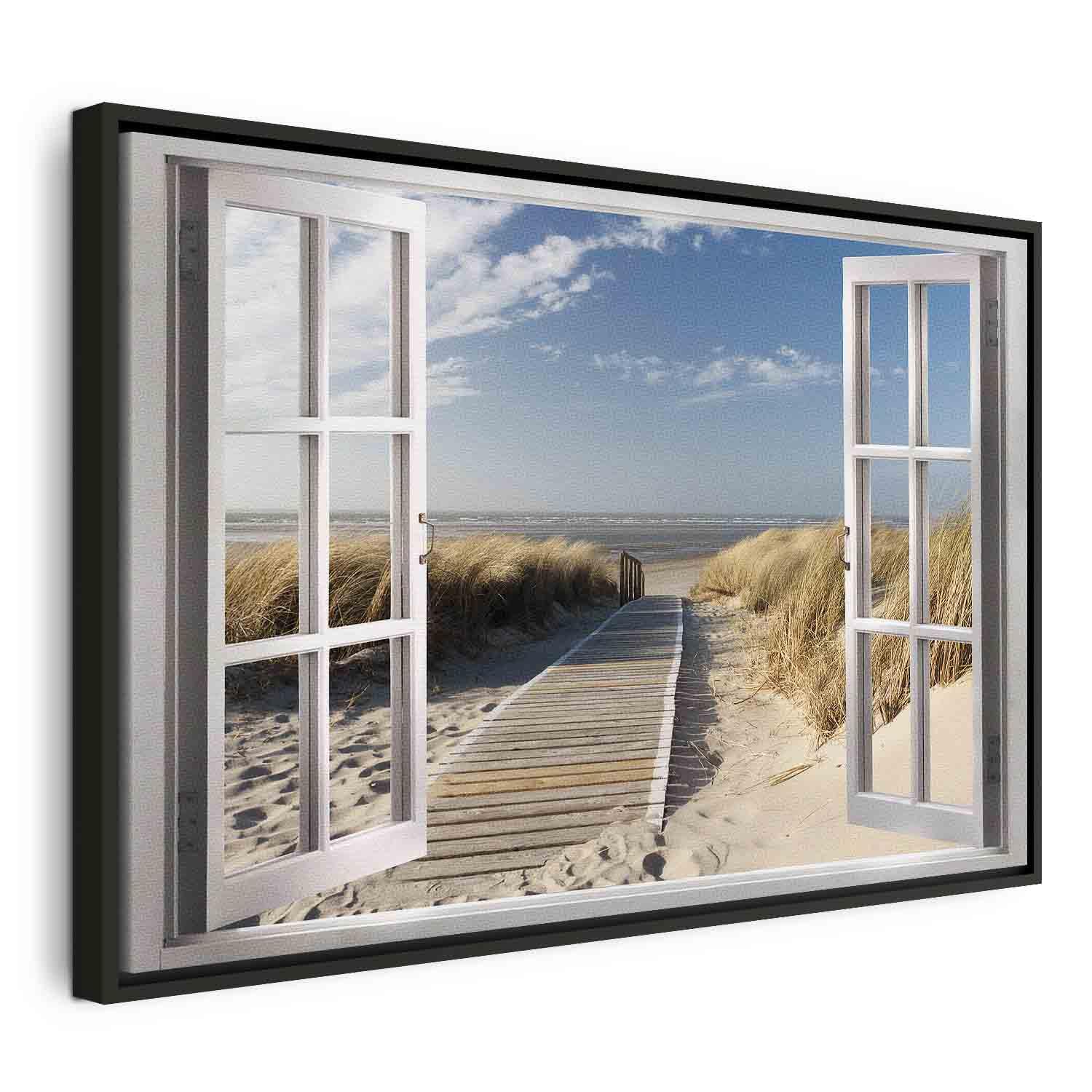 Lærredsbillede Vindue med udsigt til stranden - 90 x 60 cm - I en sort træramme