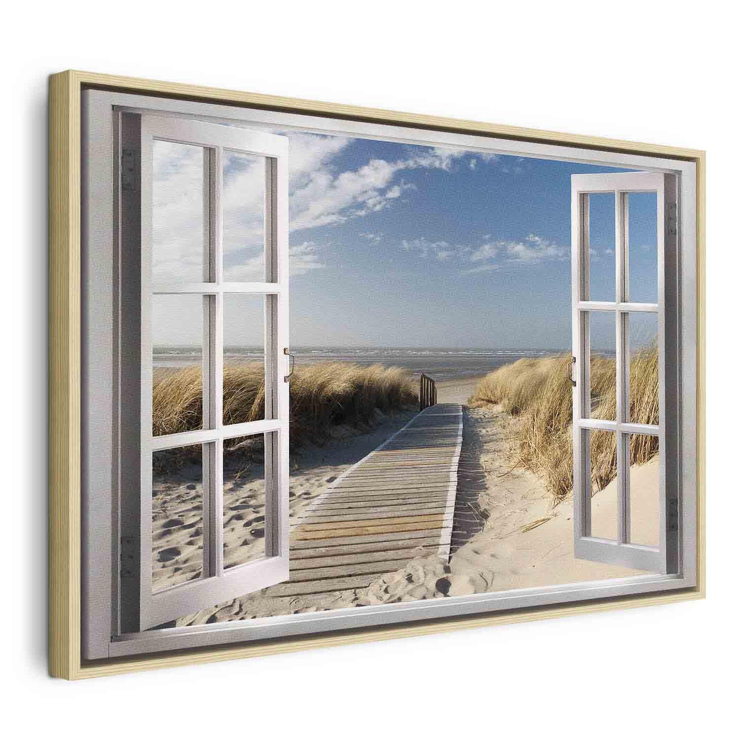 Lærredsbillede Vindue med udsigt til stranden - 90 x 60 cm - I en naturlig træramme