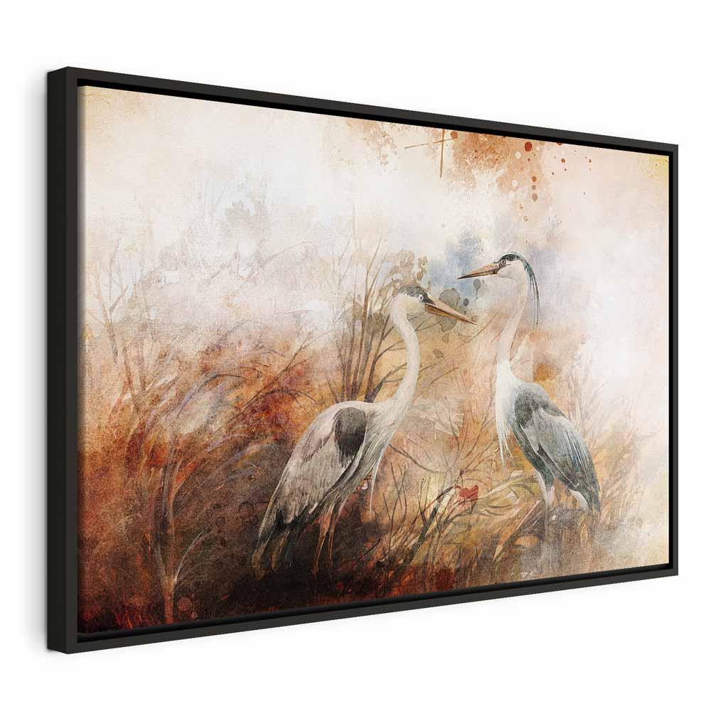 Billede på lærred Hejrer på jagt - bredt format - 60 x 40 cm - I en sort træramme