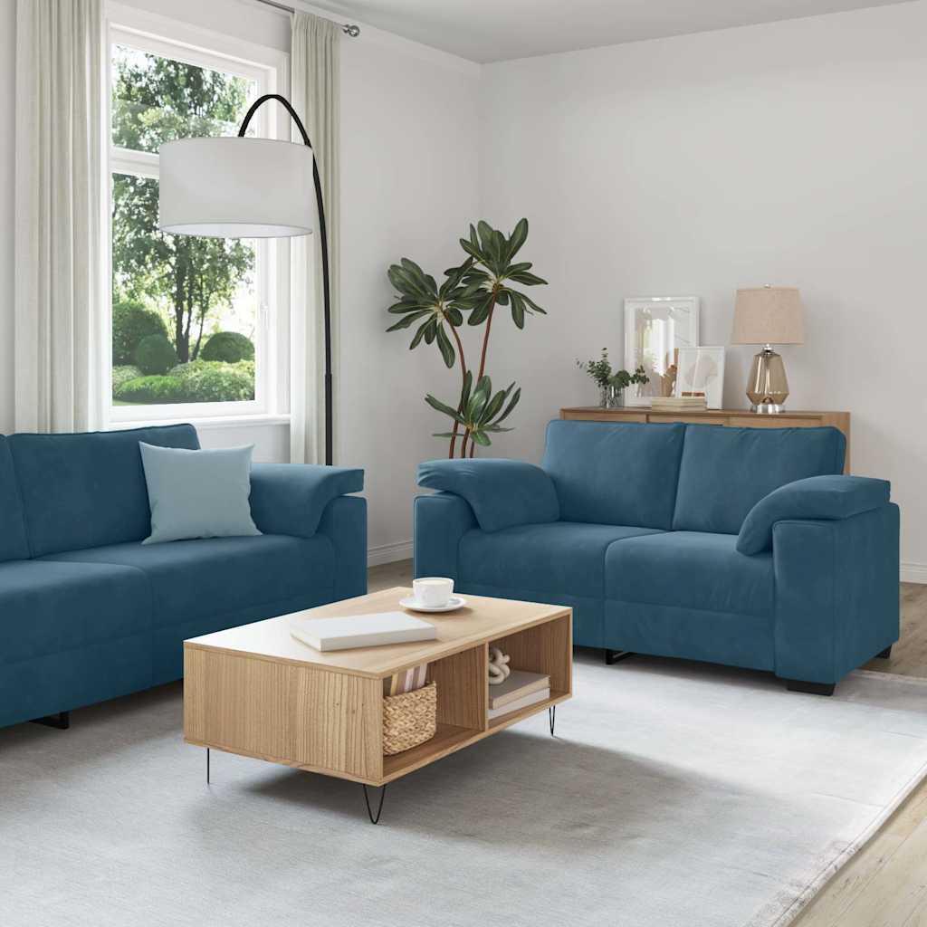 2-delt sofasæt i blå fløjl med hynder