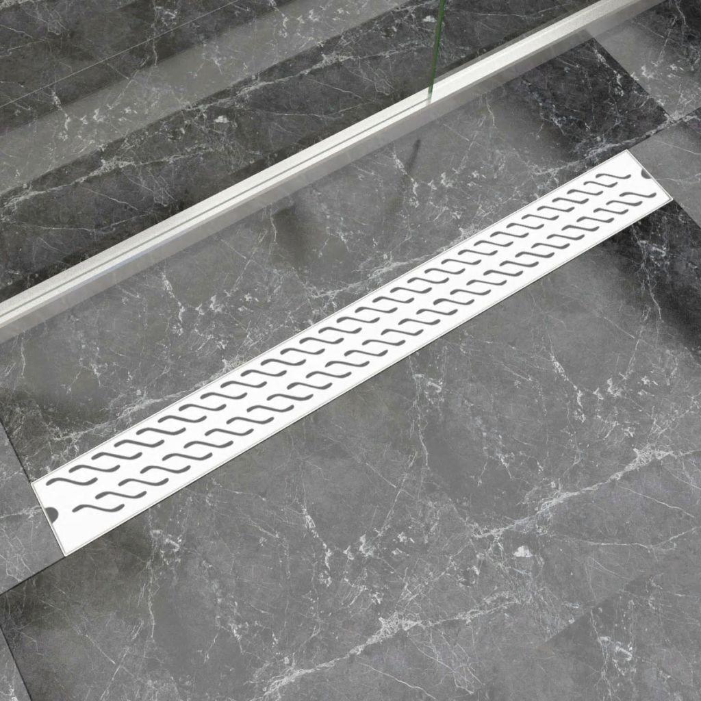 Lineært bruseafløb 1030x140 mm rustfrit stål bølgedesign