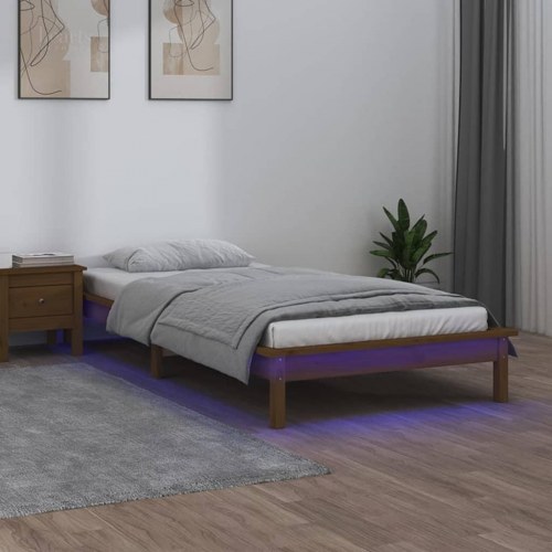 Sengeramme i massivt fyrretræ med LED-lys 75x190 cm - gyldenbrun