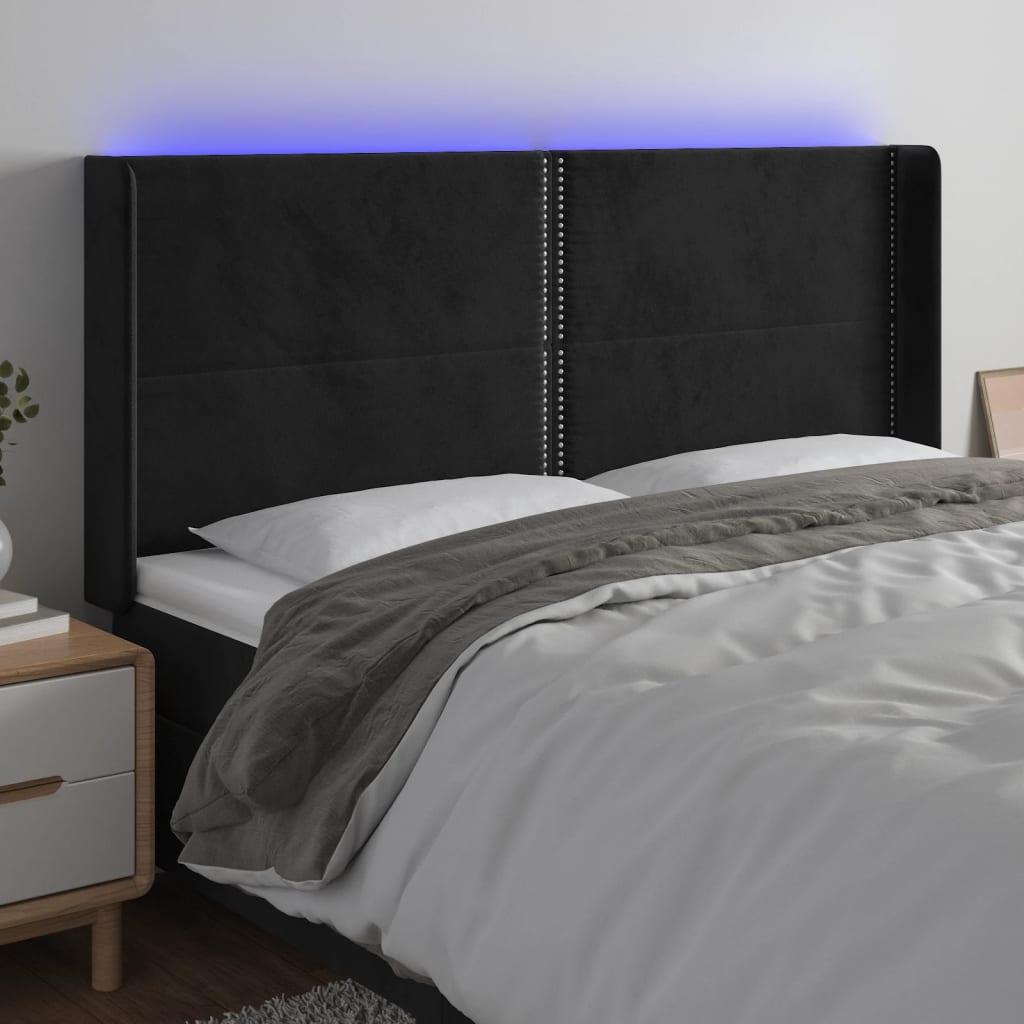 Sengegavl med LED-lys 183x16x118/128 cm fløjl sort billede
