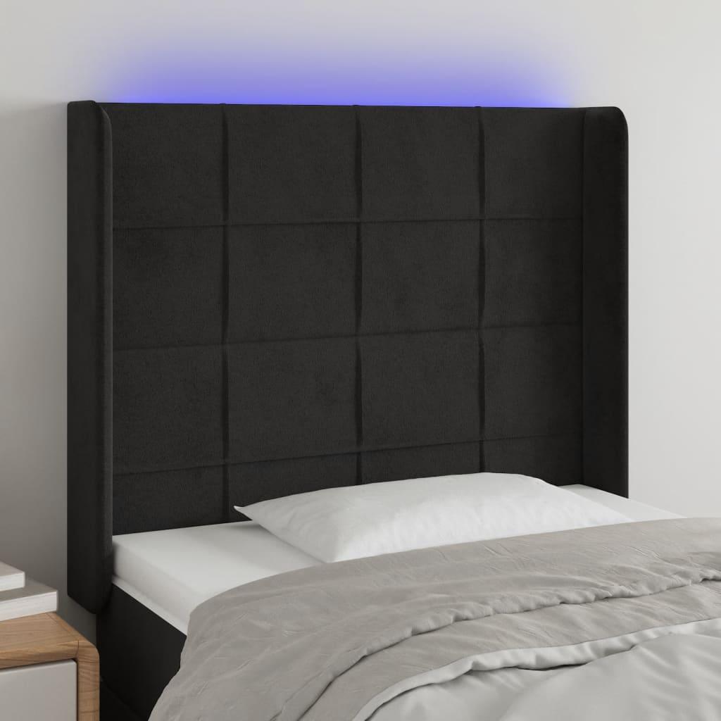 Sengegavl med LED-lys 83x16x118/128 cm fløjl sort billede