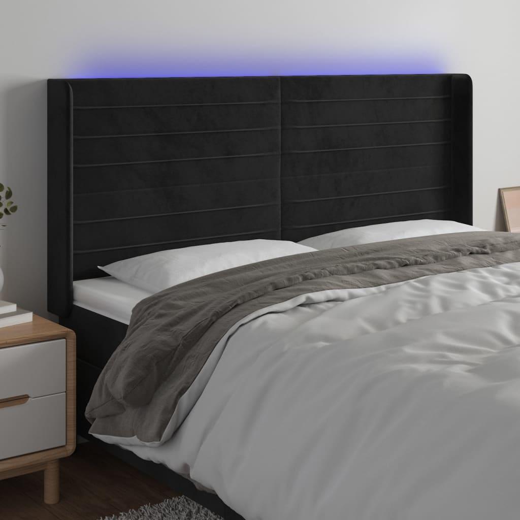 Sengegavl med LED-lys 203x16x118/128 cm fløjl sort billede