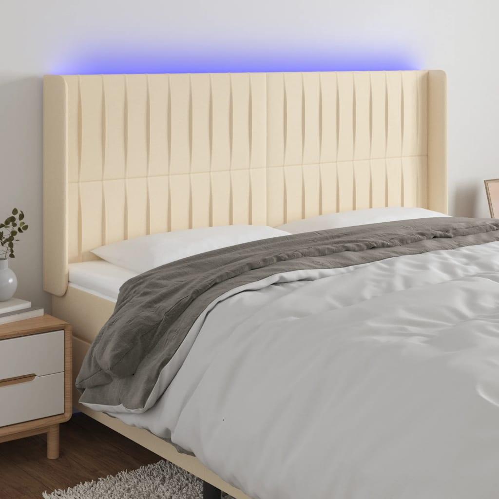 vidaXL sengegavl med LED-lys 183x16x118/128 cm stof cremefarvet