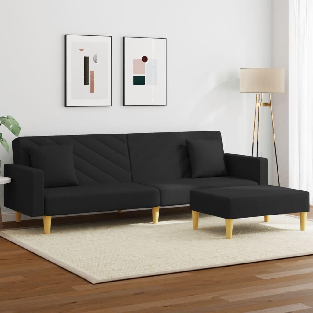 2-personers sovesofa med puder og fodskammel i sort stof