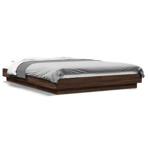 Sengeramme med LED-lys 140x190 cm konstrueret træ brunt eg