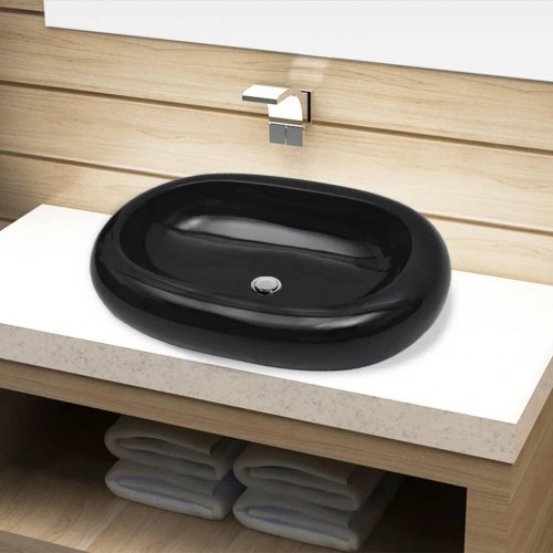 Oval håndvask i keramik - sort bordplademodel 63×42 cm
