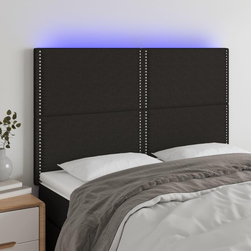 Sengegavl med LED-lys 144x5x118/128 cm stof sort billede