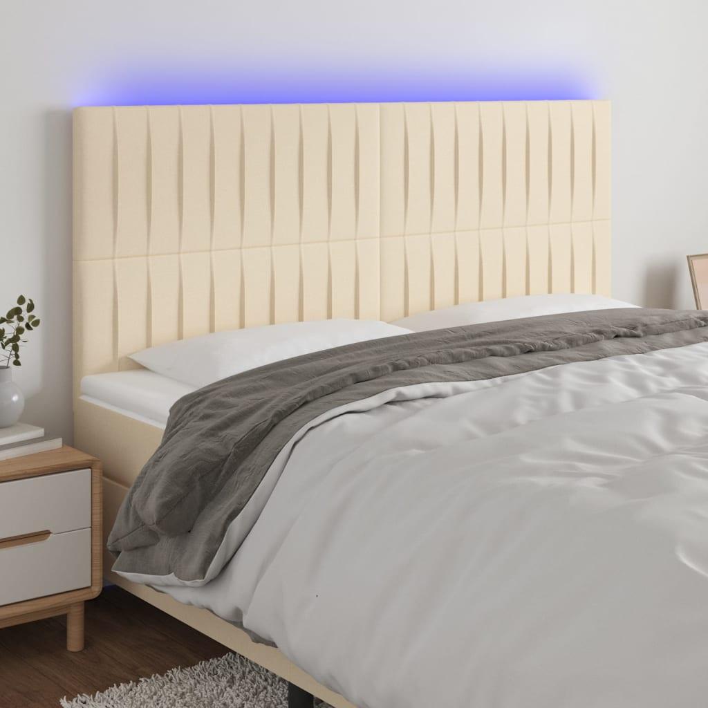 Sengegavl med LED-lys 180x5x118/128 cm stof cremefarvet